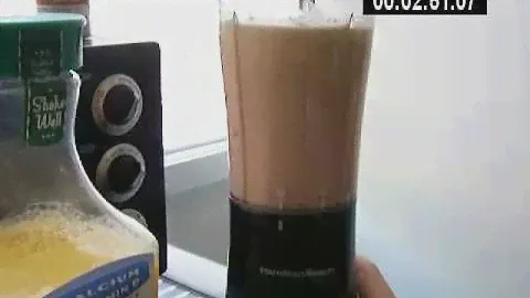 Hamilton Beach Single Serve Blender (making fruit smoothie)